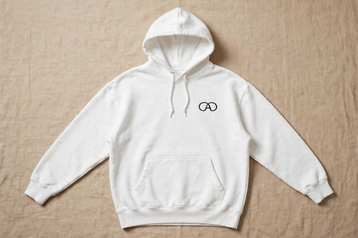 Adibelli hoodie wit flatlay