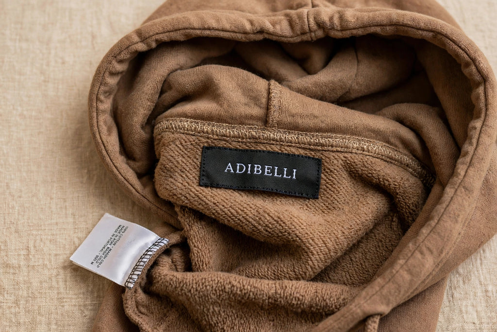 Adibelli hoodie caramel label detail