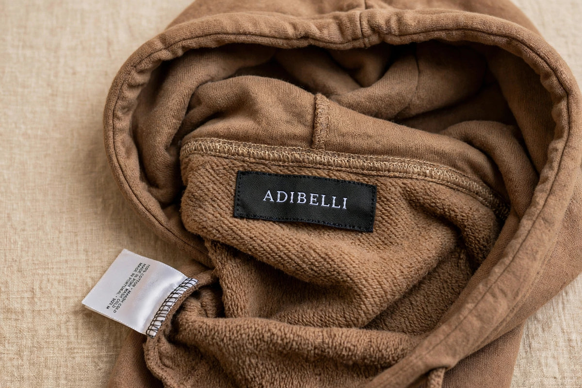 Adibelli hoodie caramel label detail